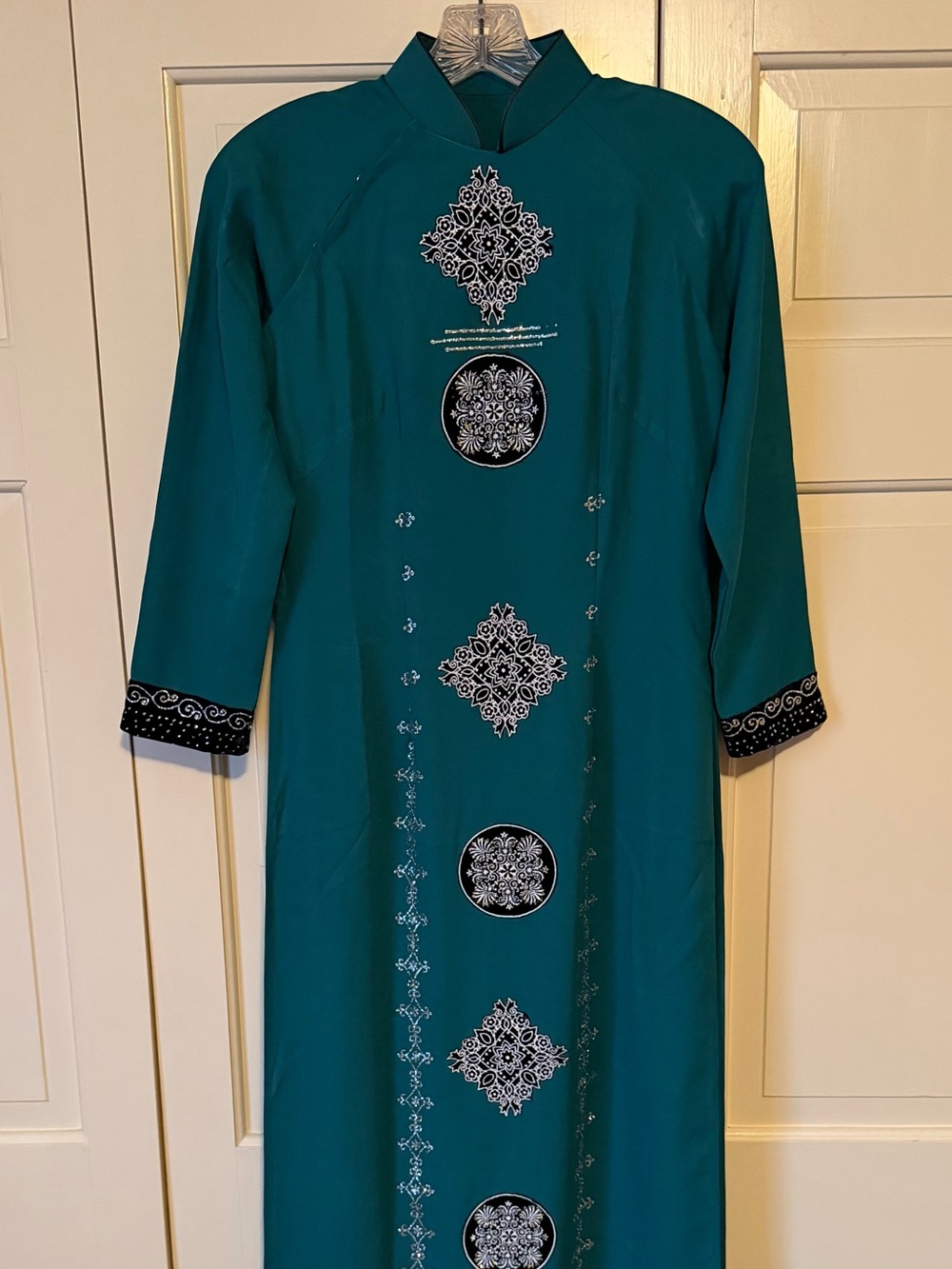 Teal traditional Vietnamese áo dài